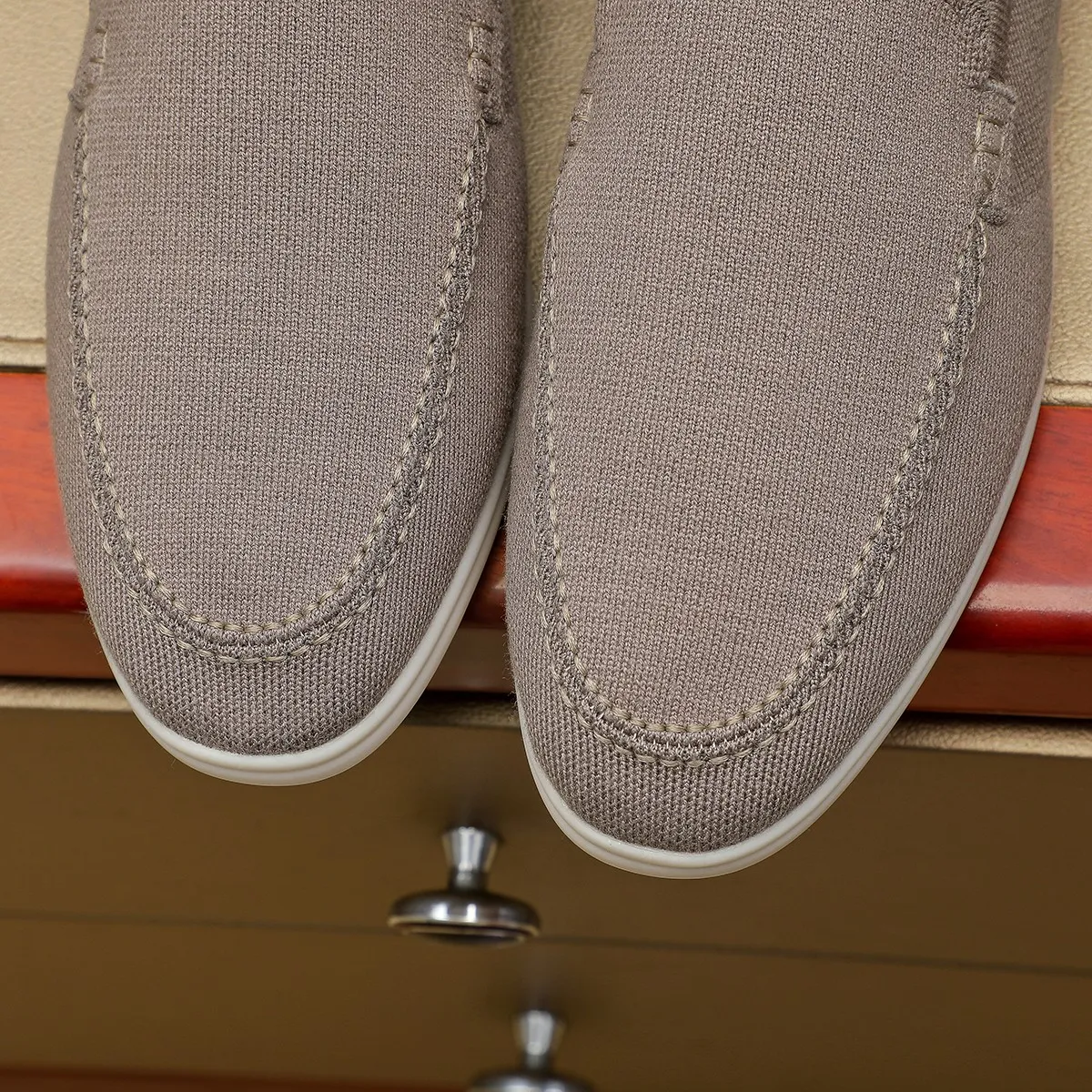 Men's Men's Shoes 💰 400 Loro PIana moccasin made of wish wool fabric. The upper is made of knitted fabric, made on a loom, and then attached to a rubber sole. The Rain System's water-repellent treatment enhances the shoe's functional design, while the suede details give the shoe a sense of elegance and sophistication. Made from Wish, fine wool from Australian and New Zealand Merino sheep 38-44